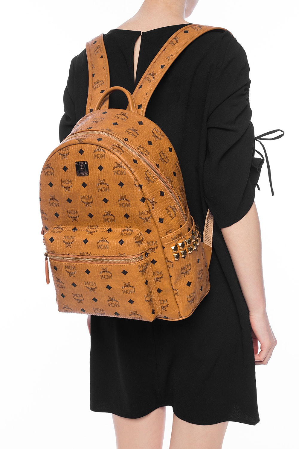 Mcm backpack size discount m